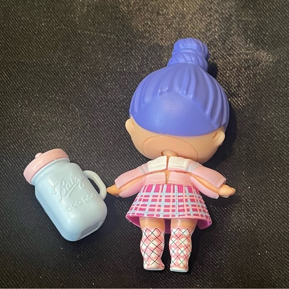 L.O.L. Surprise! Toys Caddie Cutie Purple Bun Lol Doll Poshmark